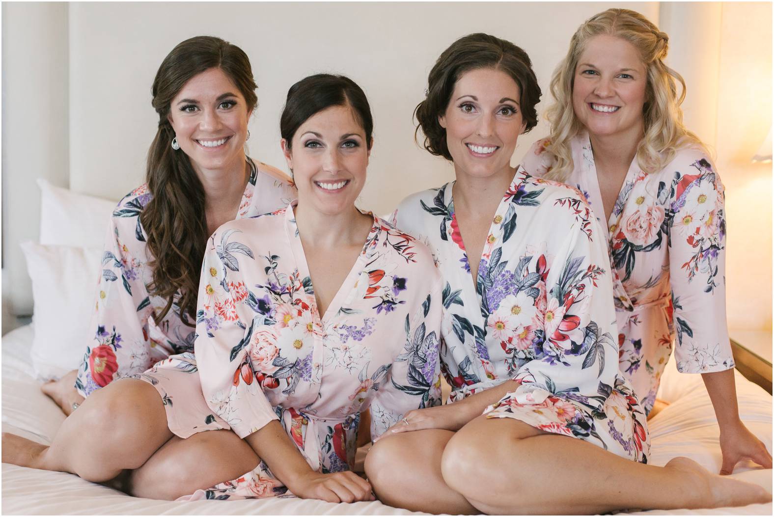 Bride and bridesmaids in floral robes