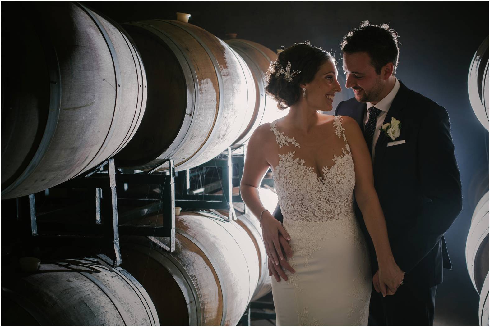 Creative cellar bride and groom portrait