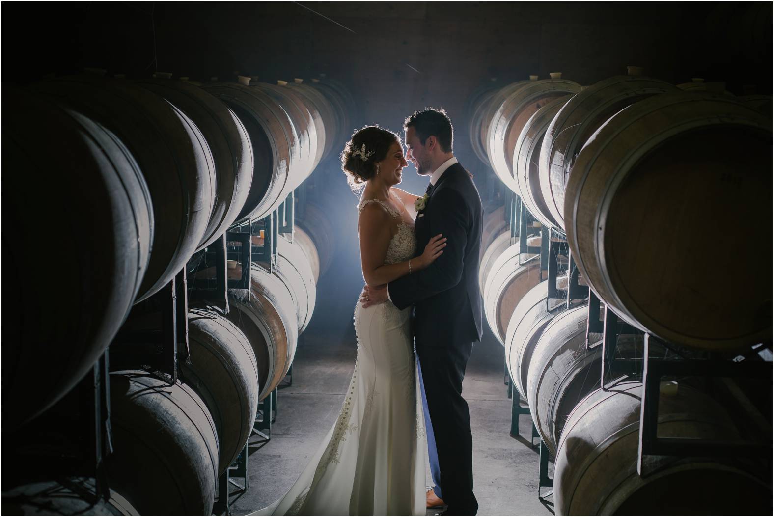 Creative cellar bride and groom portrait